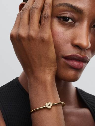 Bracelet rigide avec fermoir cœur rayonnant