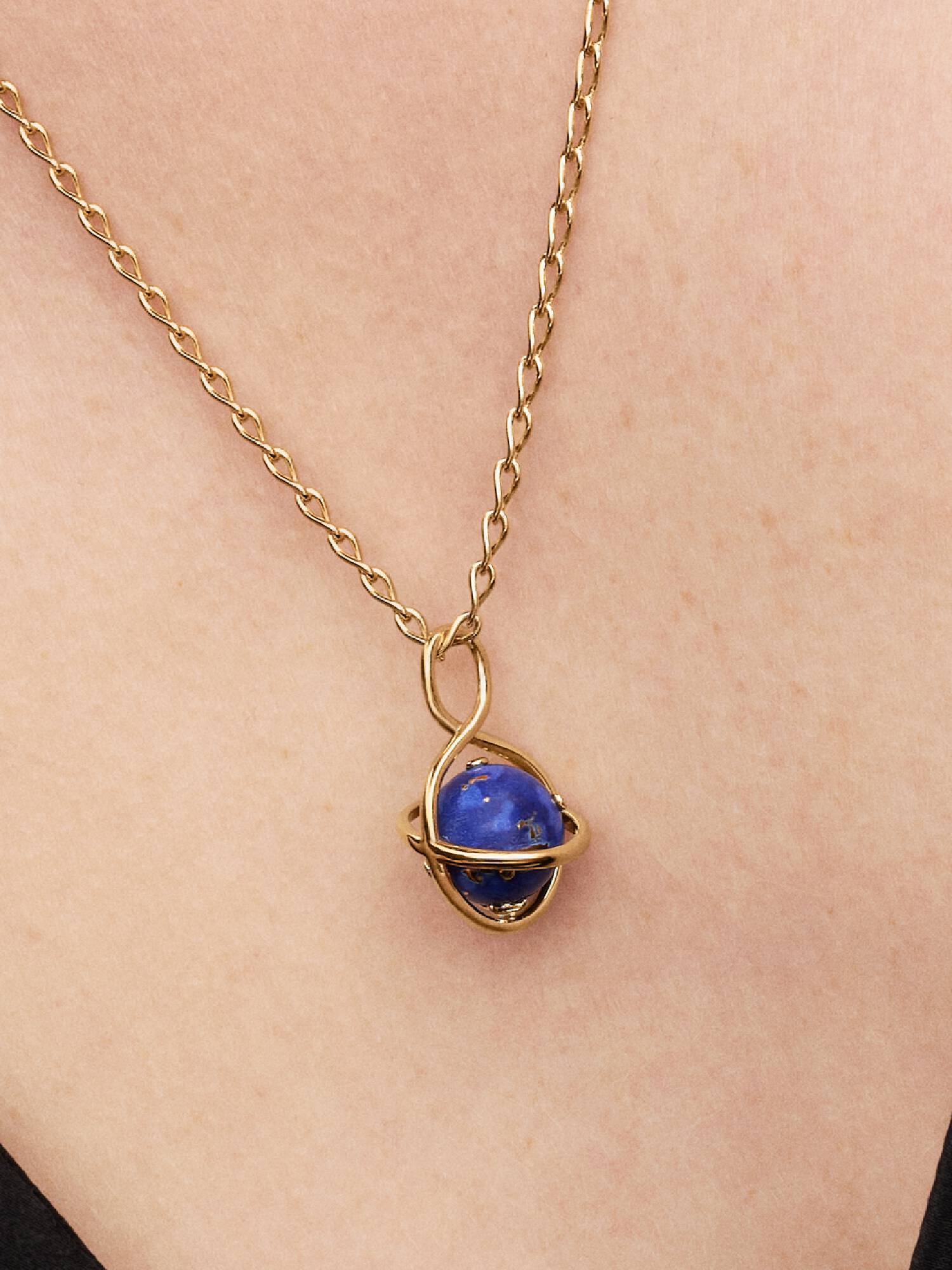 Charm-pendentif Planète tournante bleu céleste