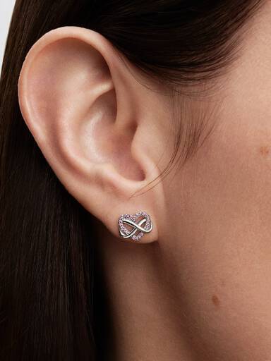 Clous d’oreilles scintillants avec cœur rose et symbole d’infini