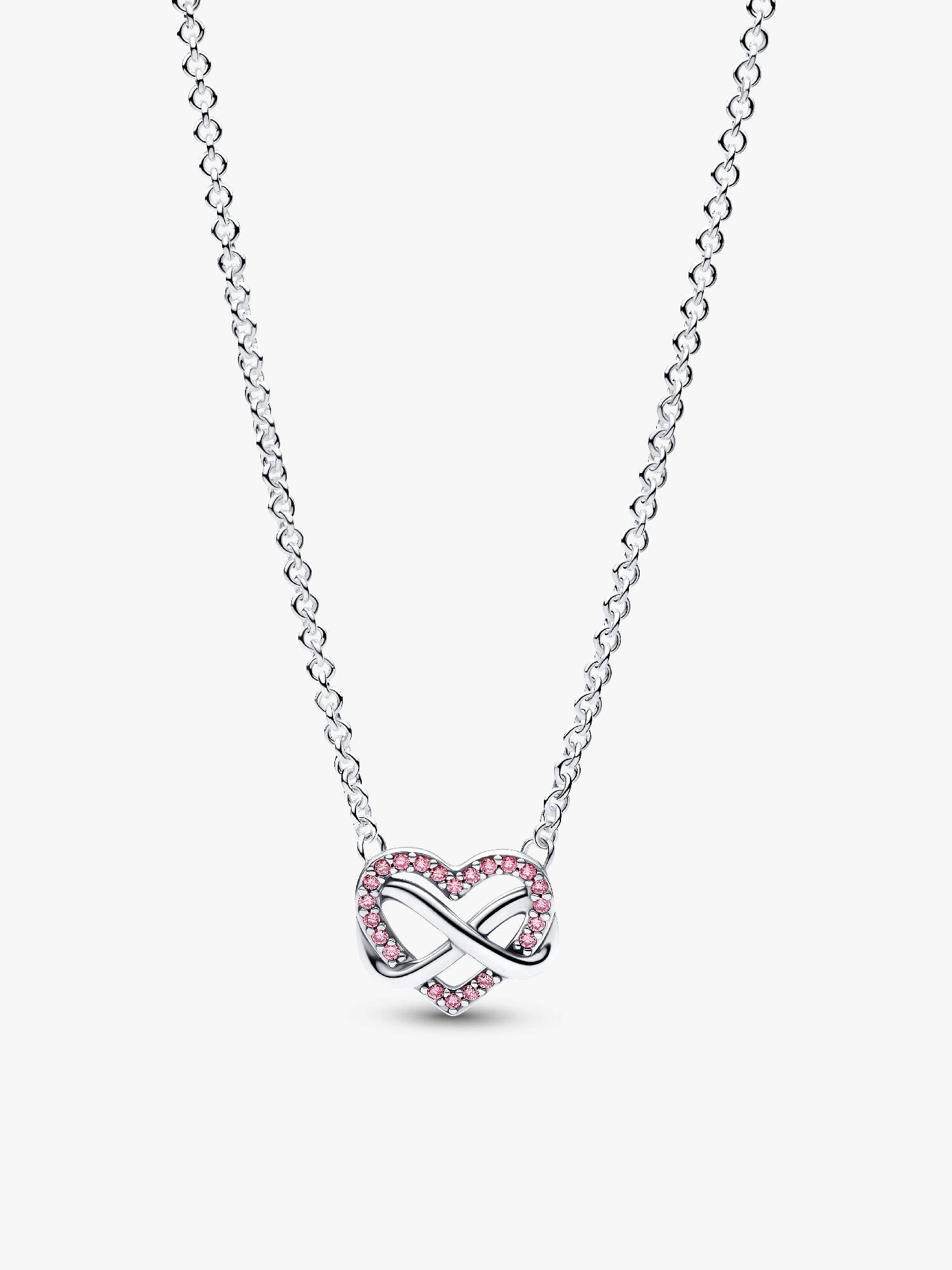 Collier scintillant avec cœur rose et symbole d’infini