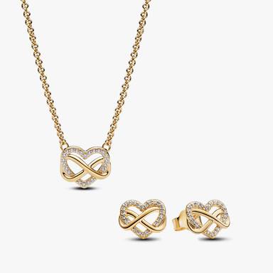 Ensemble de colliers et boucles d'oreilles scintillants avec cœur et symbole d’infini