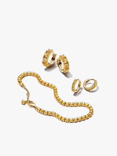 Ensemble de bracelet et boucles d'oreilles tennis jaunes scintillants