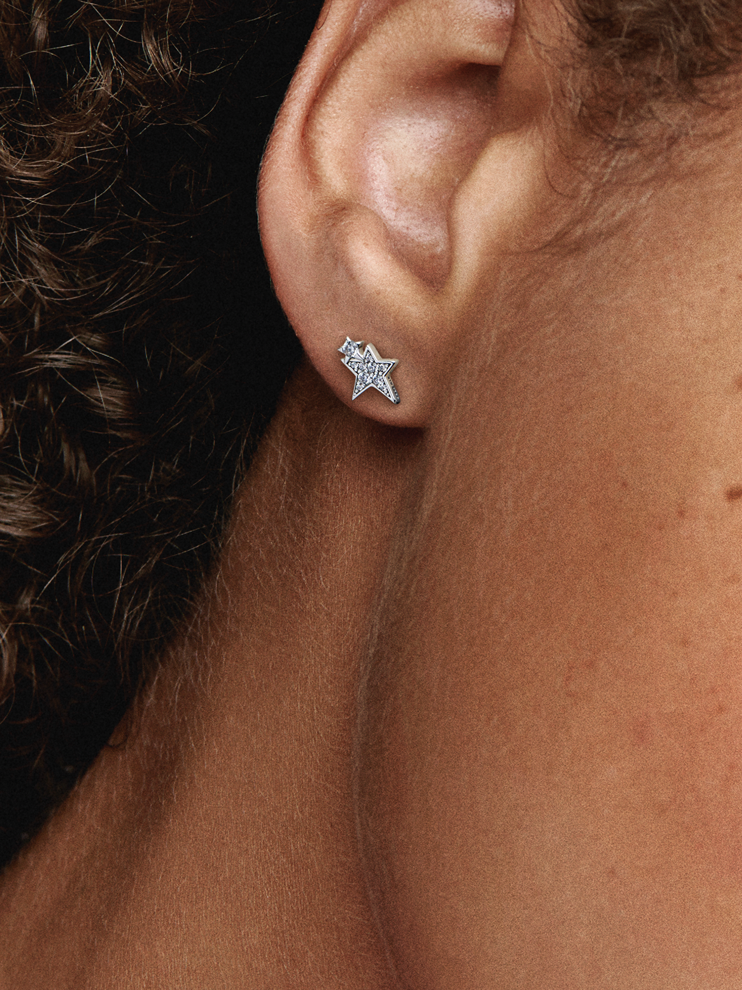 Clous d’oreille Étoile scintillante asymétrique