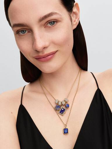Charm-pendentif Planète tournante bleu céleste