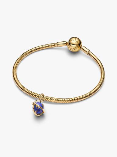 Charm-pendentif Planète tournante bleu céleste