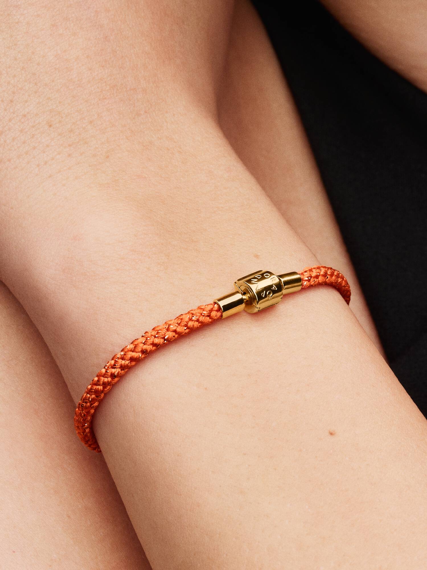 14k gold-plated bracelet with shimmering orange cord