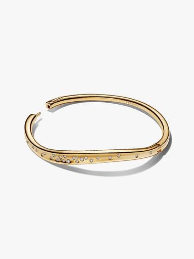 Bracelet rigide de forme organique avec pierres